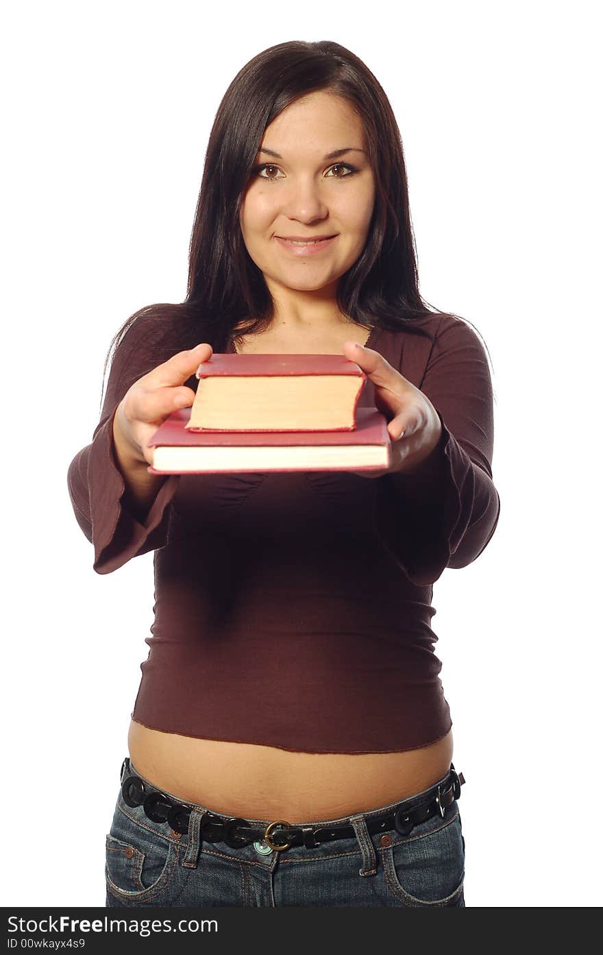 Attractive brunette woman with books on white background