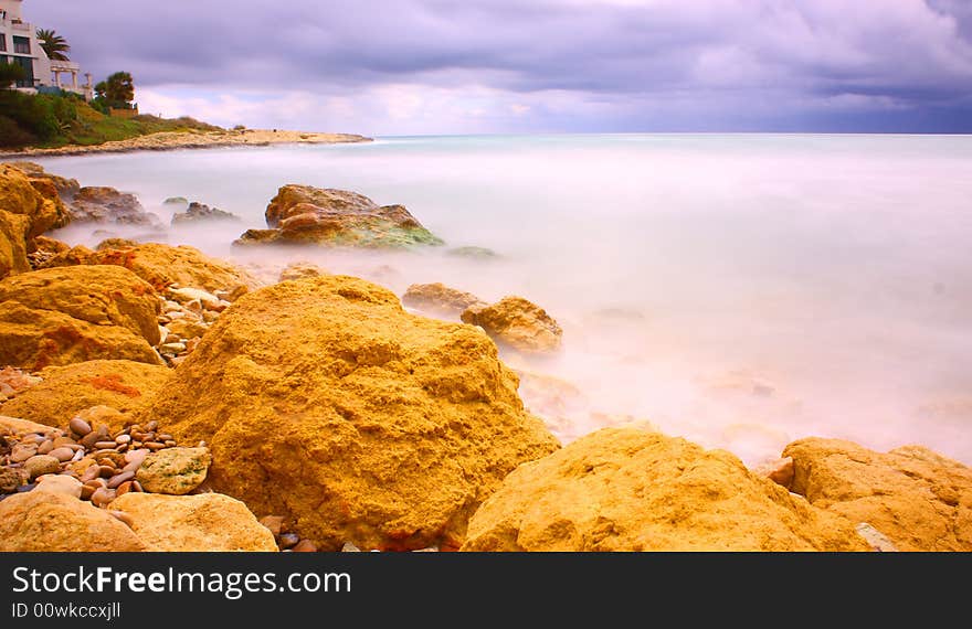 Rocks and water filled with fog looking like a ozean dream. Rocks and water filled with fog looking like a ozean dream