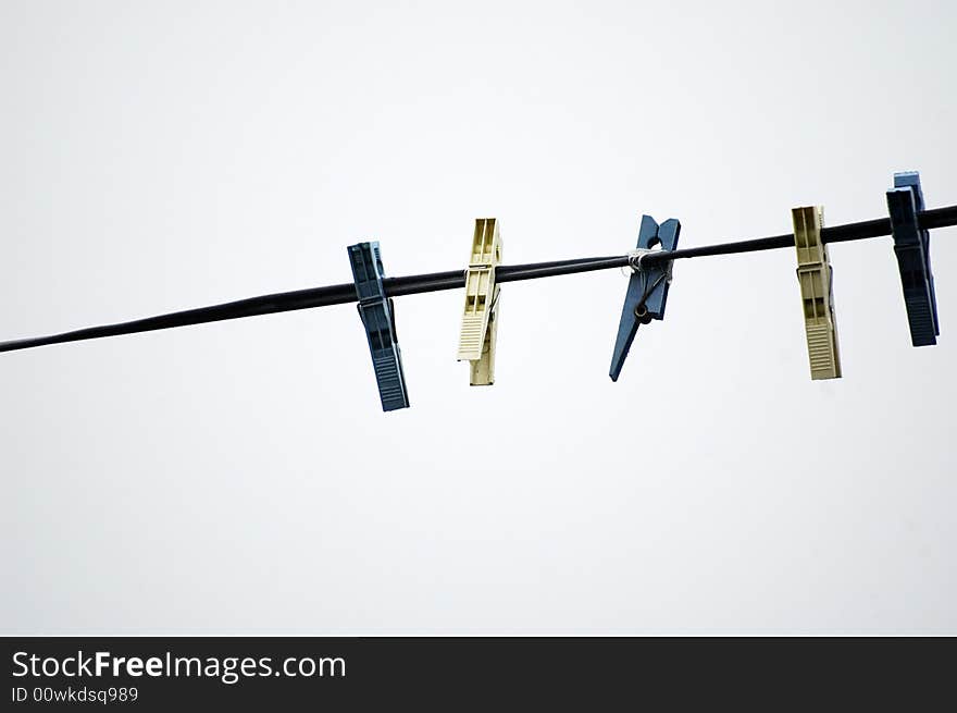 Clothe spins on a rope in front of a mountain cottage. Clothe spins on a rope in front of a mountain cottage.