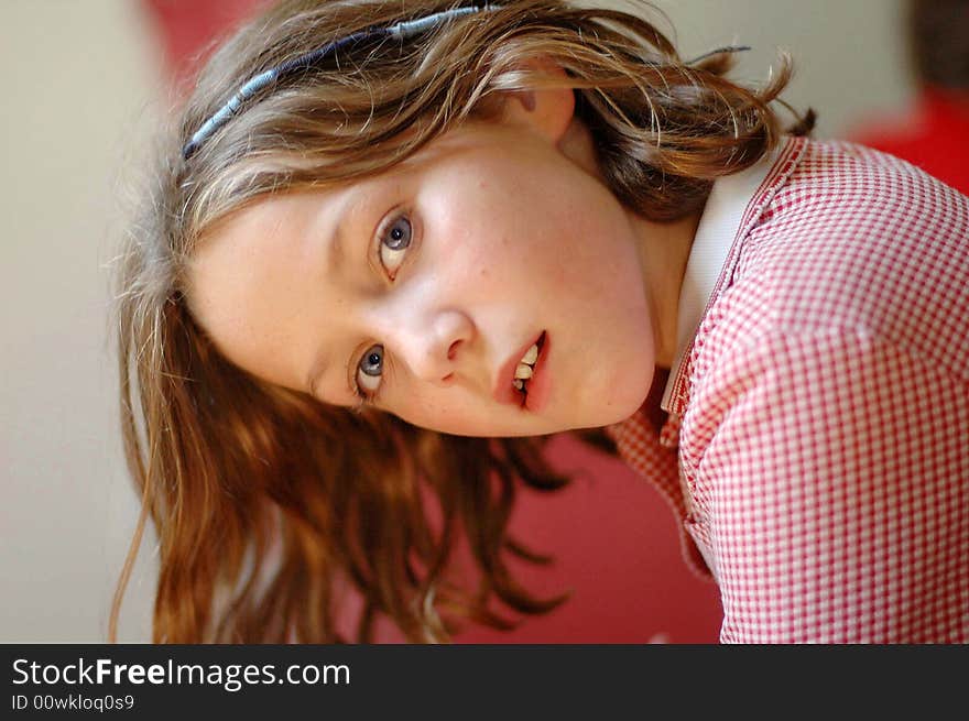 Close-up interior portrait of girl, natural light. Close-up interior portrait of girl, natural light