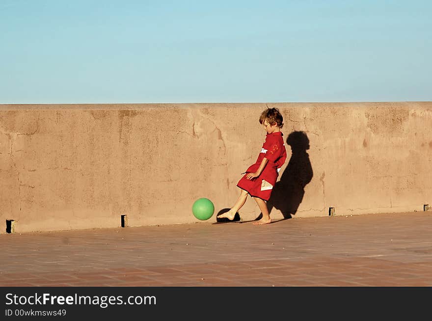 Candid outdoor image of young boy. Candid outdoor image of young boy