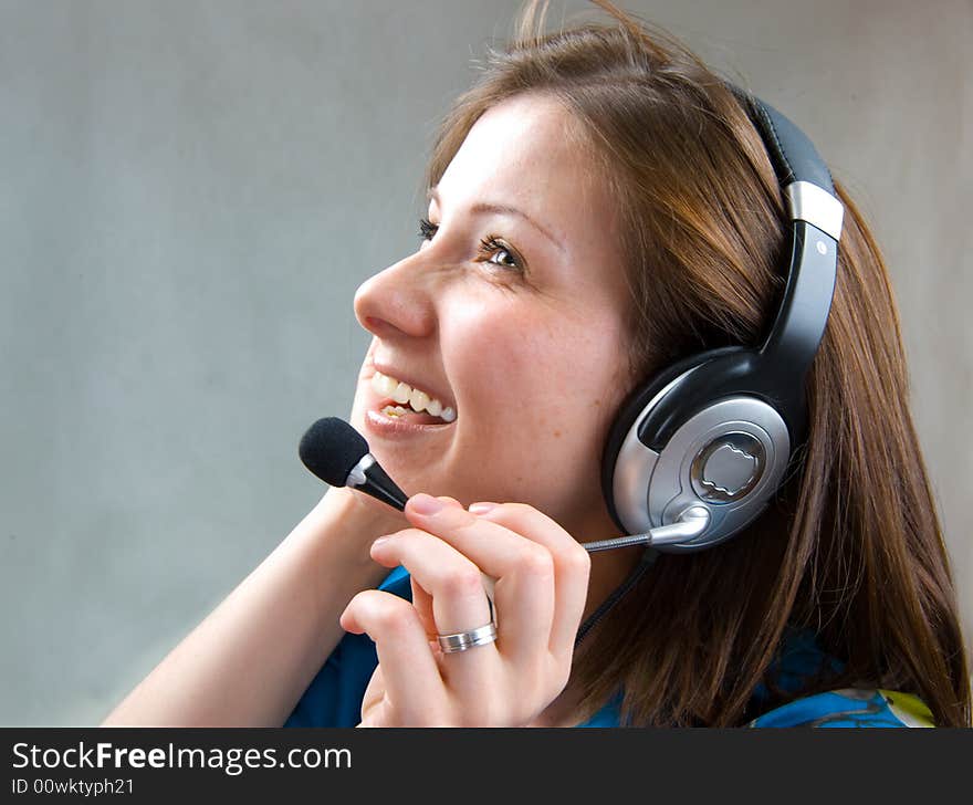 Smiling business woman. Over grey background