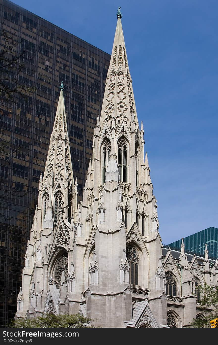 The facade of the Saint Patrick Cathedral in New York City, on a deep blue sky. The facade of the Saint Patrick Cathedral in New York City, on a deep blue sky