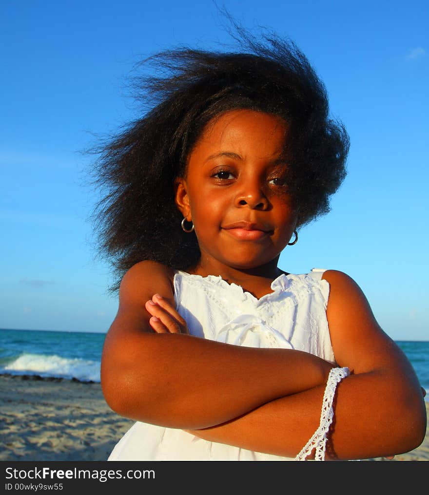 Young child with her arms crossed. Young child with her arms crossed