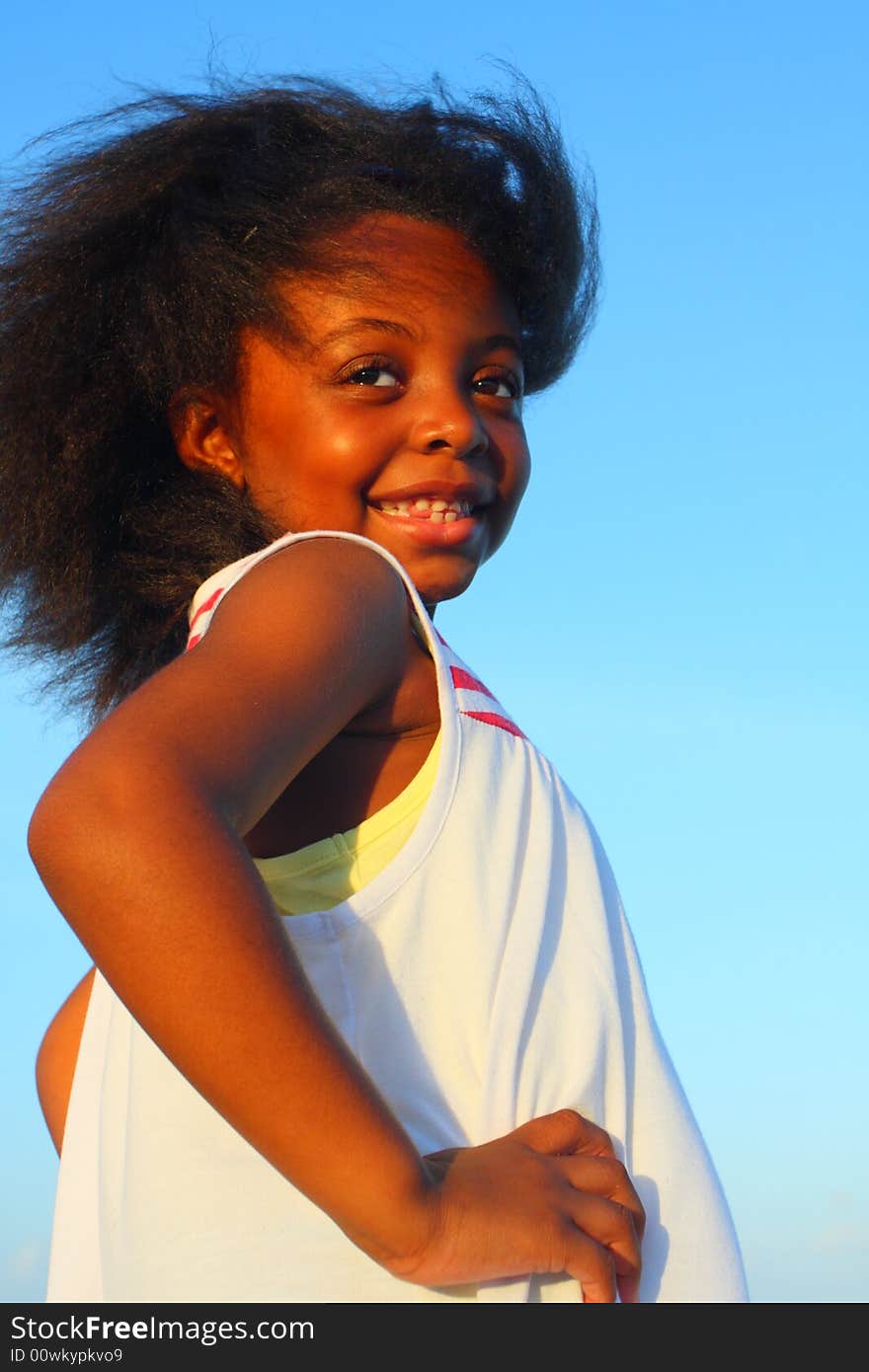 Young child modeling for the photographer. Young child modeling for the photographer.