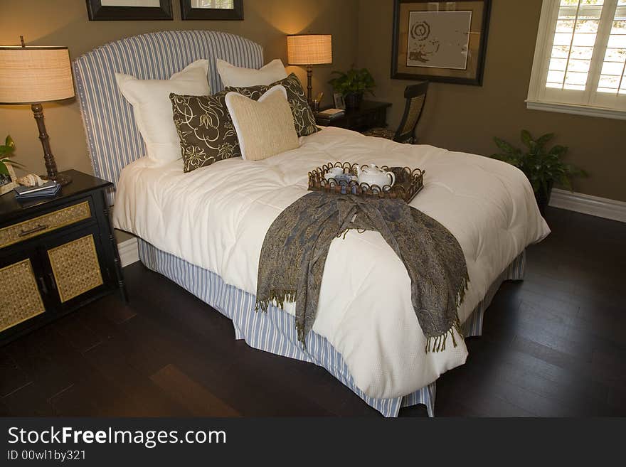 Luxury home bedroom with stylish furniture and decor. Luxury home bedroom with stylish furniture and decor.