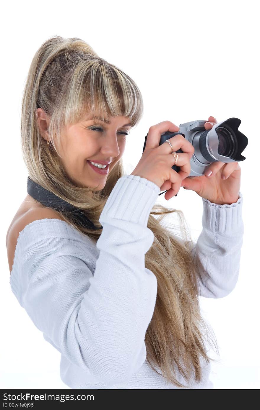 Woman with camera on white background