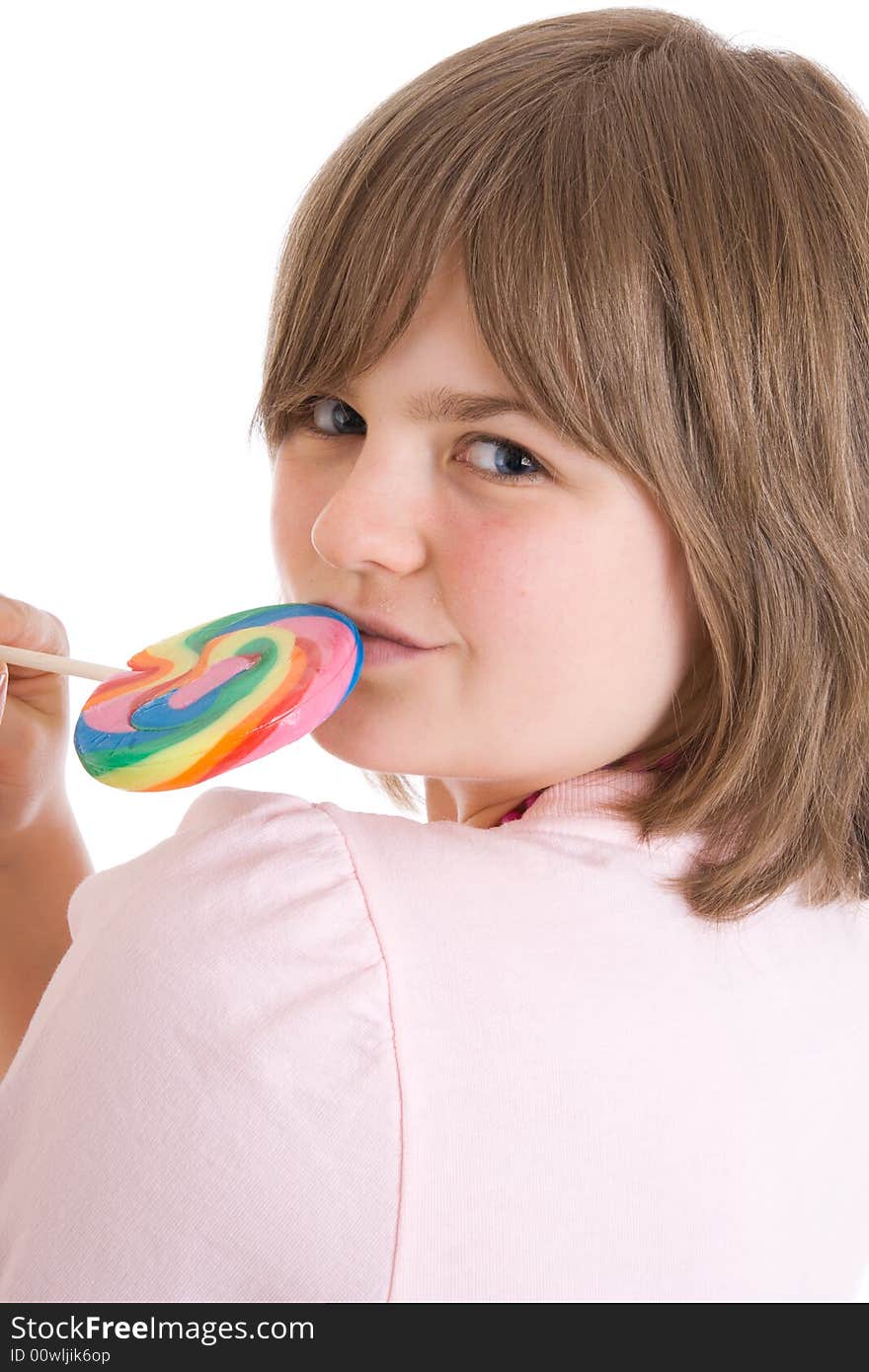 The girl with a sugar candy isolated on a white background