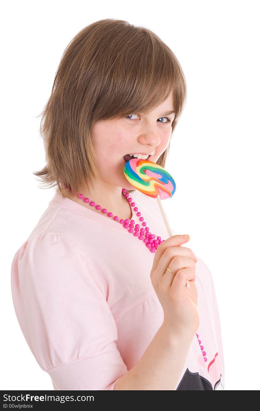 The girl with a sugar candy isolated on a white background