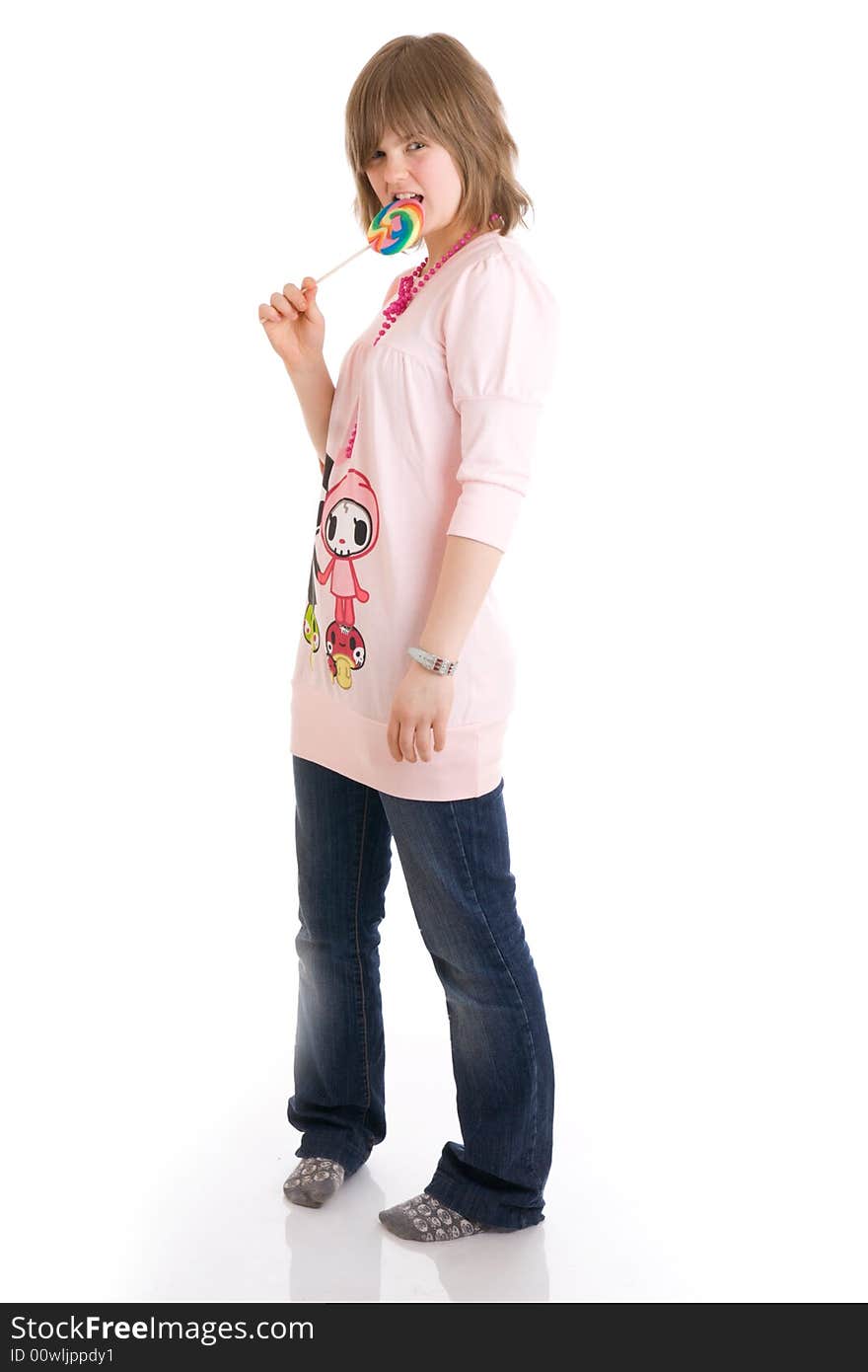 The girl with a sugar candy isolated on a white background