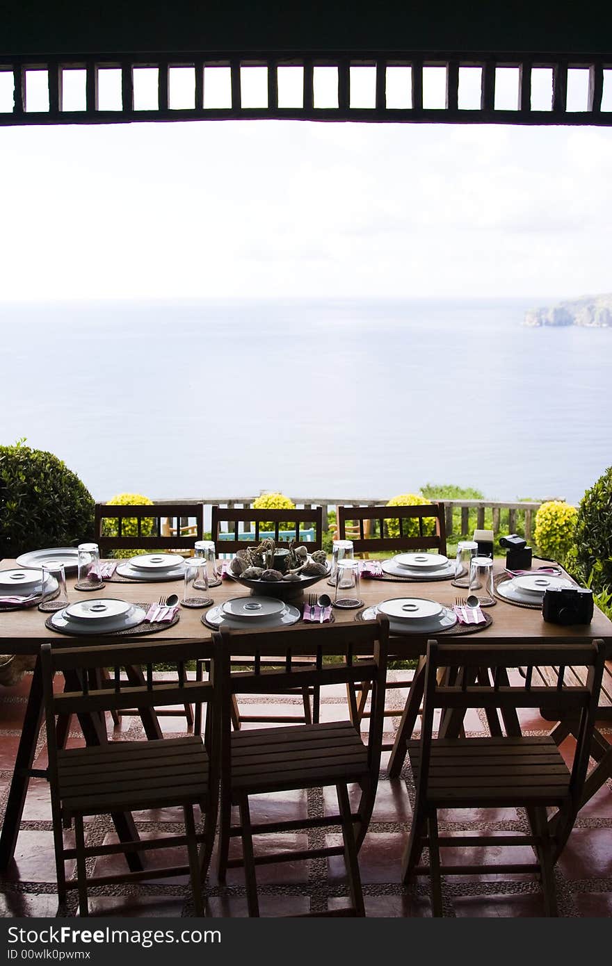 A table setting for breakfast with wooden settings. A table setting for breakfast with wooden settings