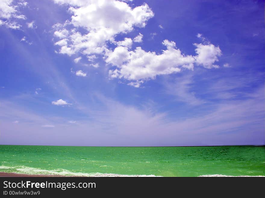 Beach scene with blue sky. Beach scene with blue sky