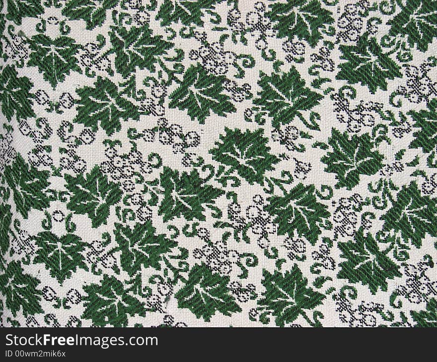 Fabric with green leafs pattern