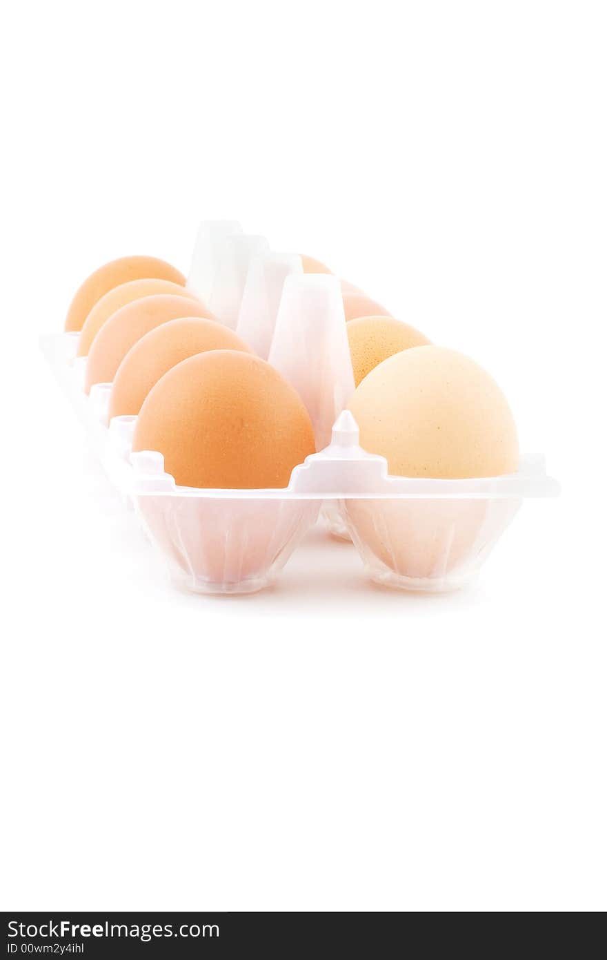 Isolated photo of some eggs in the white box