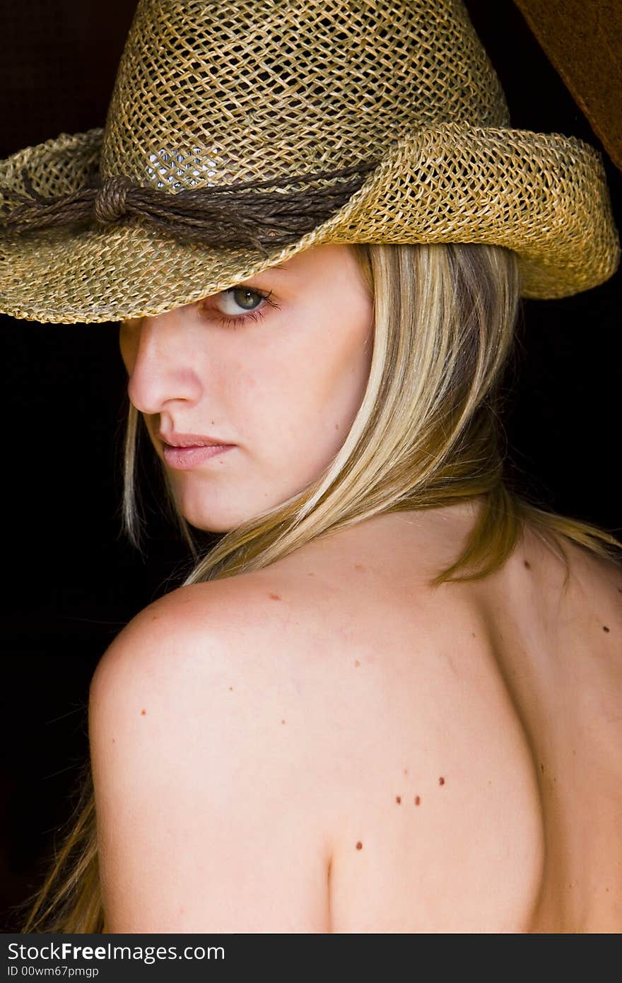 Green eyed woman with hat