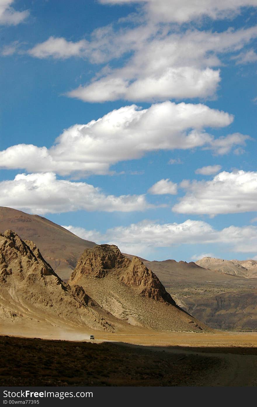 The white cumulus and blue sky over the Himalayas Mountains,Tibet Plateau China. The white cumulus and blue sky over the Himalayas Mountains,Tibet Plateau China.