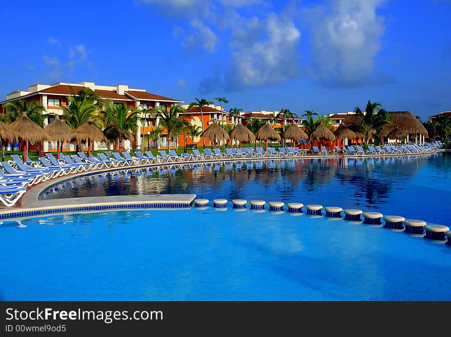 Listed Chairs Around The  Pool