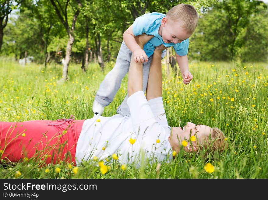 Mother and son playing together at the park