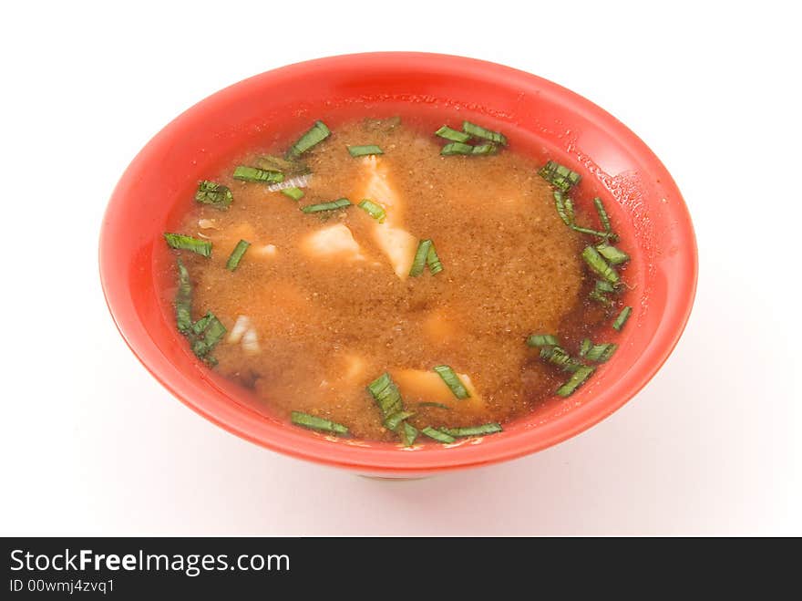 Chicken soup in plate on white. Chicken soup in plate on white