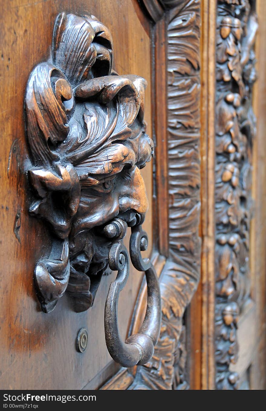 Close up of old wooden door with knocker. Close up of old wooden door with knocker