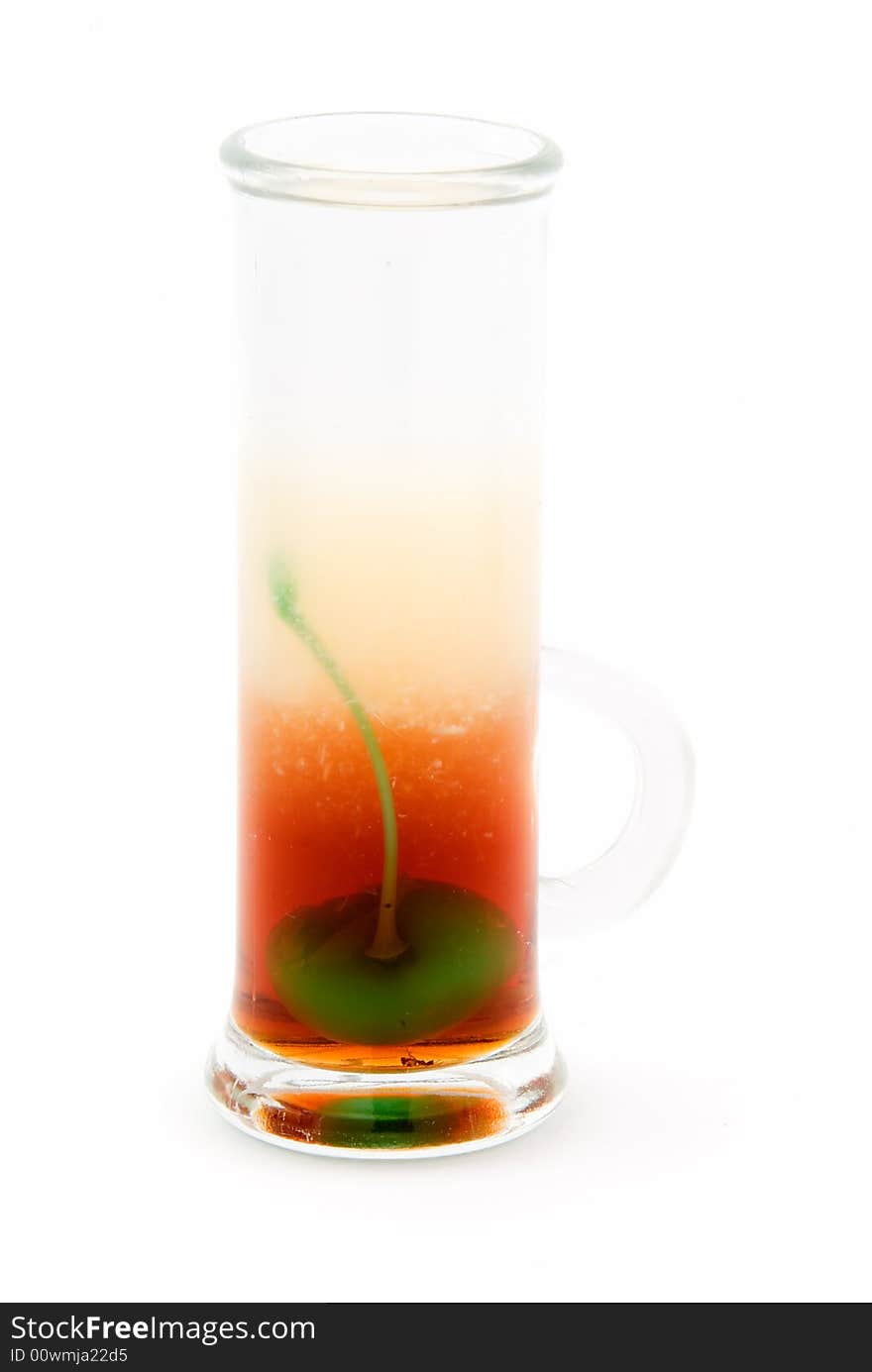 Alcohol cocktail with green cherry inside. Alcohol cocktail with green cherry inside