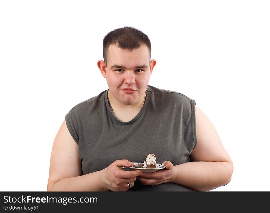 Man eats cake - photo on the white background