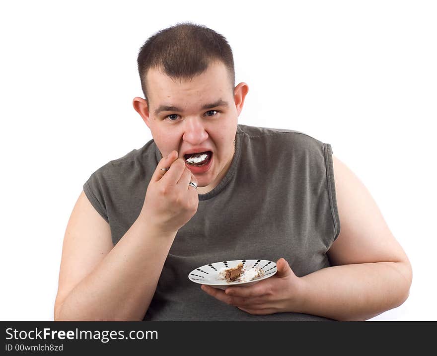 Man eats cake - photo on the white background