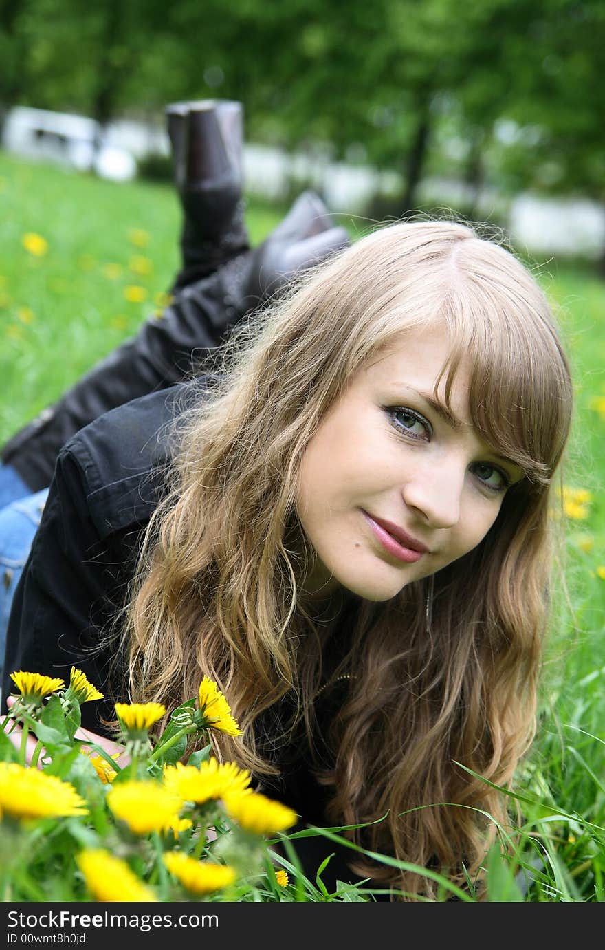 Beautiful woman enjoying the sun in the park