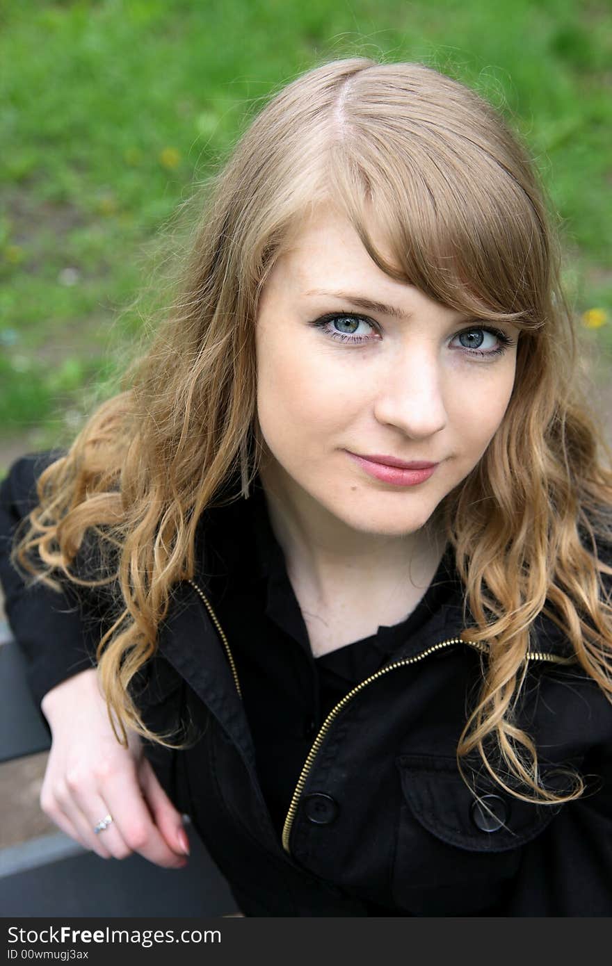 Beautiful woman enjoying the sun in the park