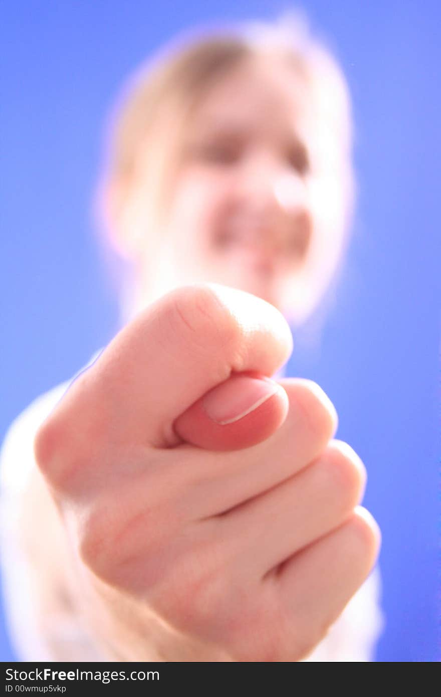 The girl shows gesture of refusal