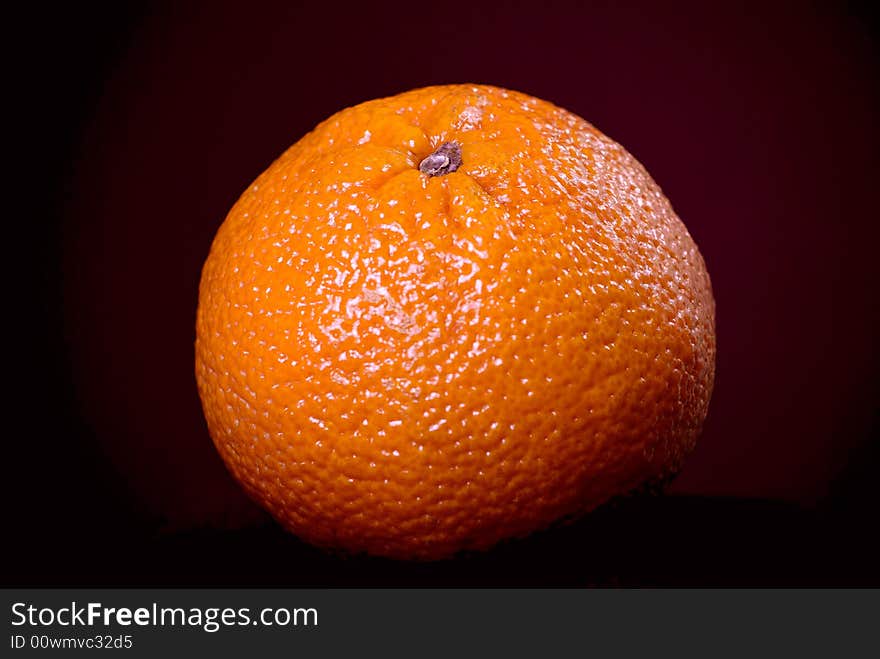 Fruit of orange on the black background