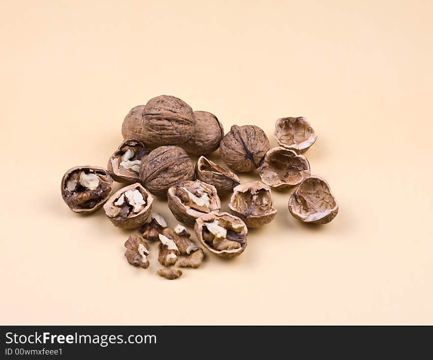 Walnuts on the orange background