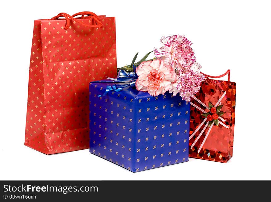 Gifts And Flowers On A White Background