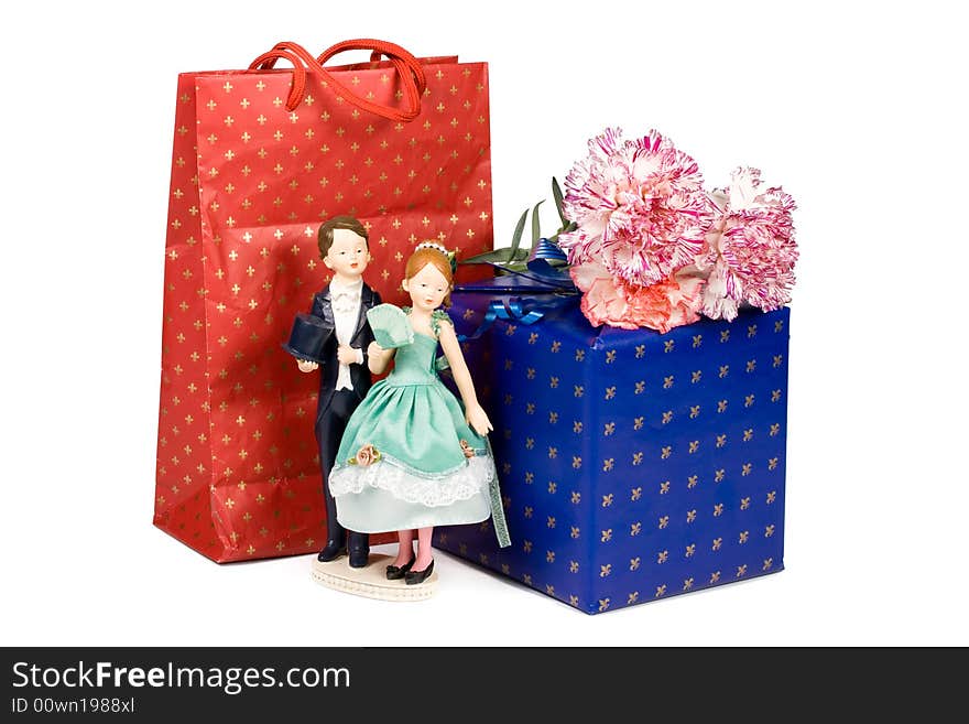 Gifts and flowers on a white background