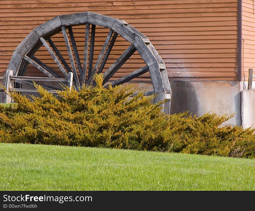 Old watermill next to a building no longer in use