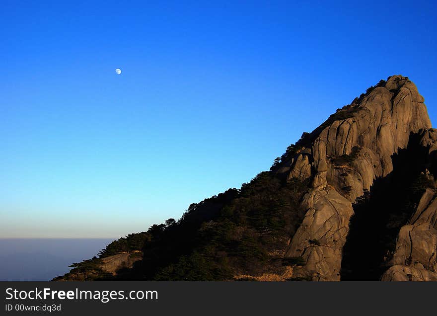 Moon rise at huangshan mountain