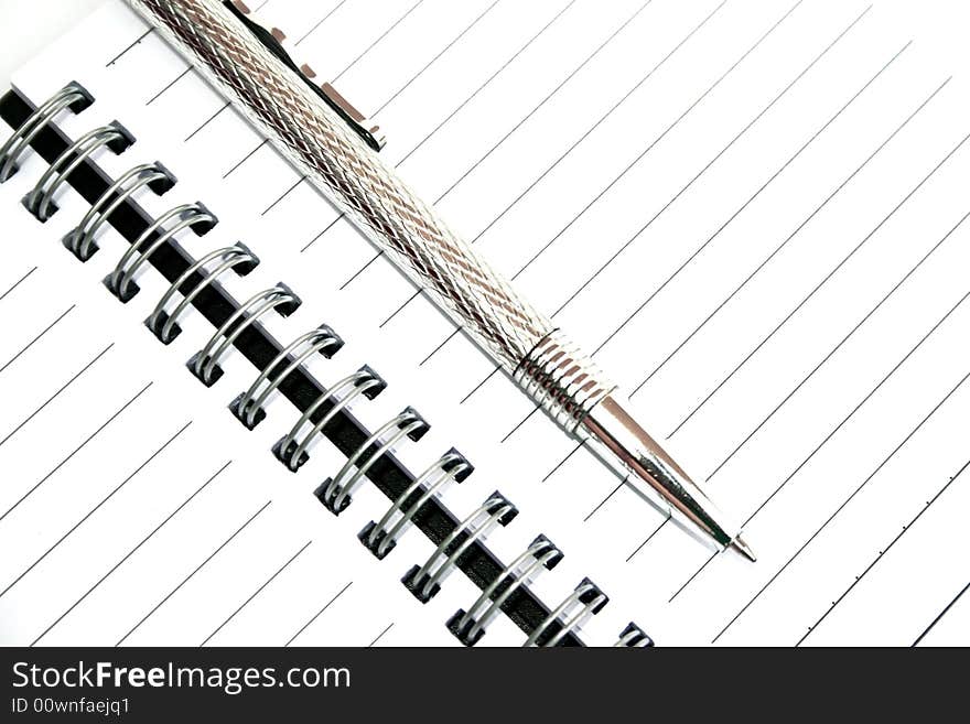 Silvery pen and note-book