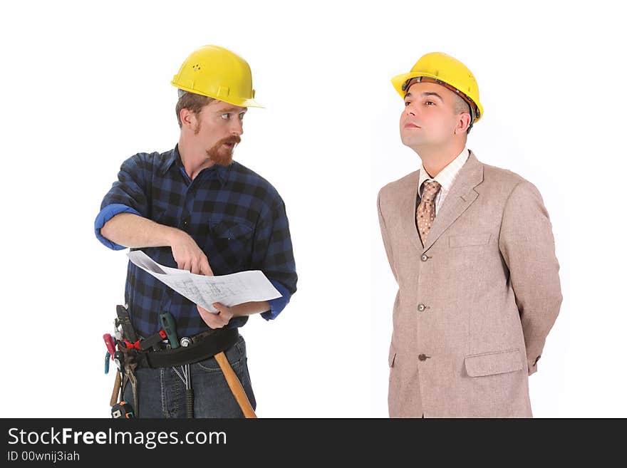 Construction worker pointing on architectural plans and architect. Construction worker pointing on architectural plans and architect