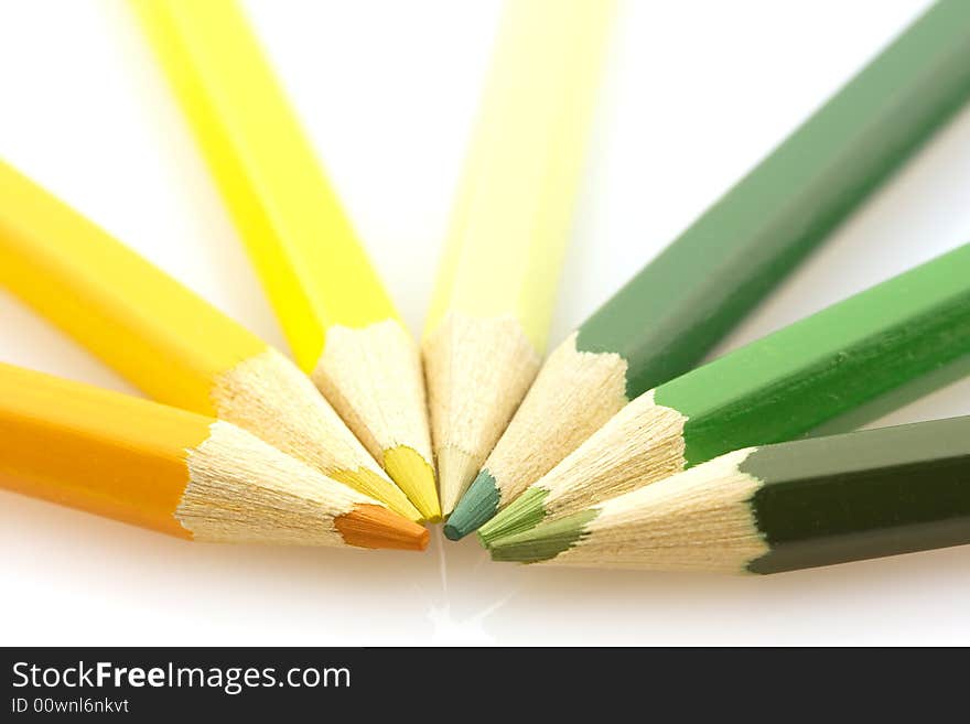 Yellow and green pencils isolated