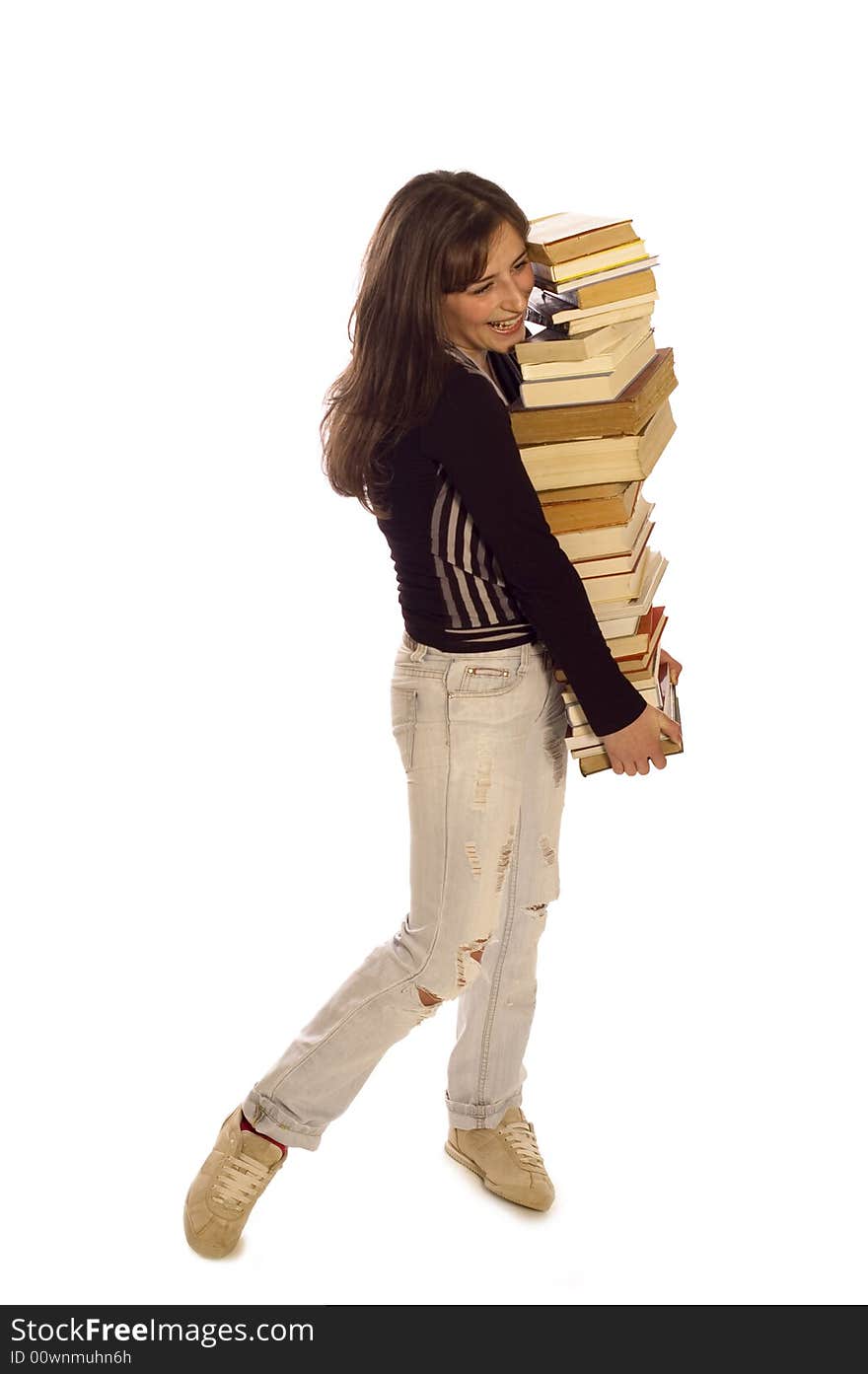 Young student girl with her books on white