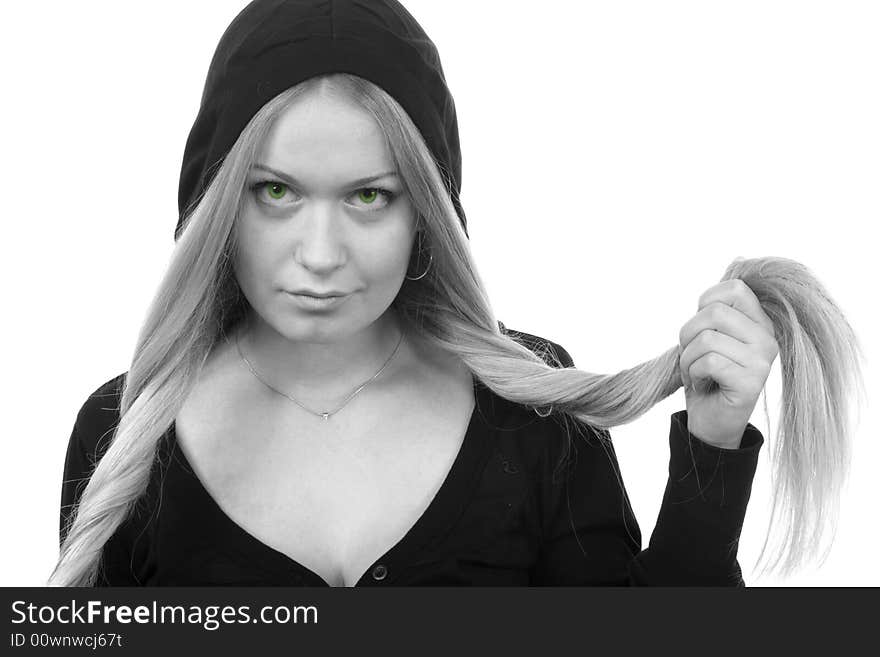 Green-eyed blonde woman in black hood. copy space. Green-eyed blonde woman in black hood. copy space.