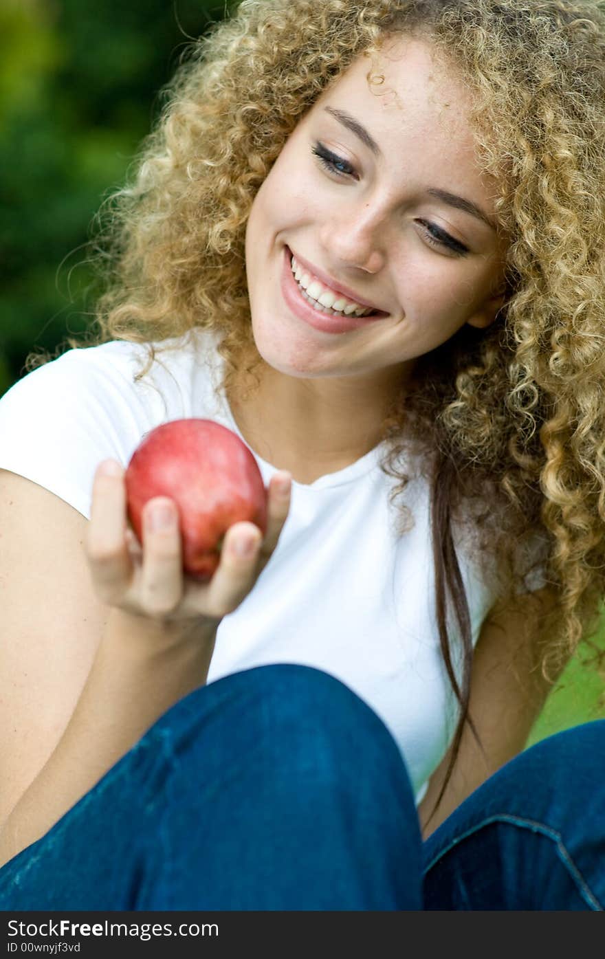 Holding an Apple