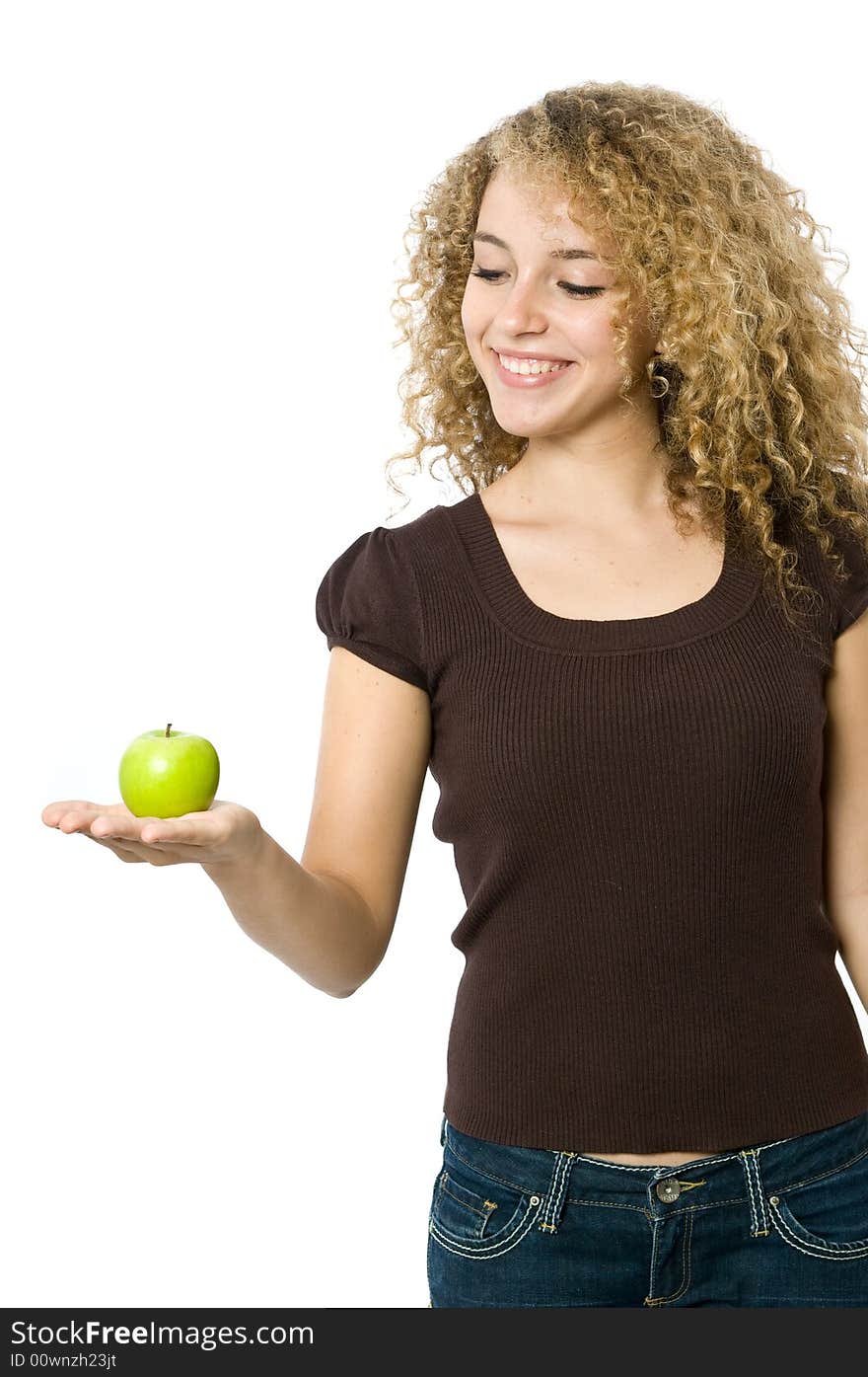 A beautiful young women holding an apple