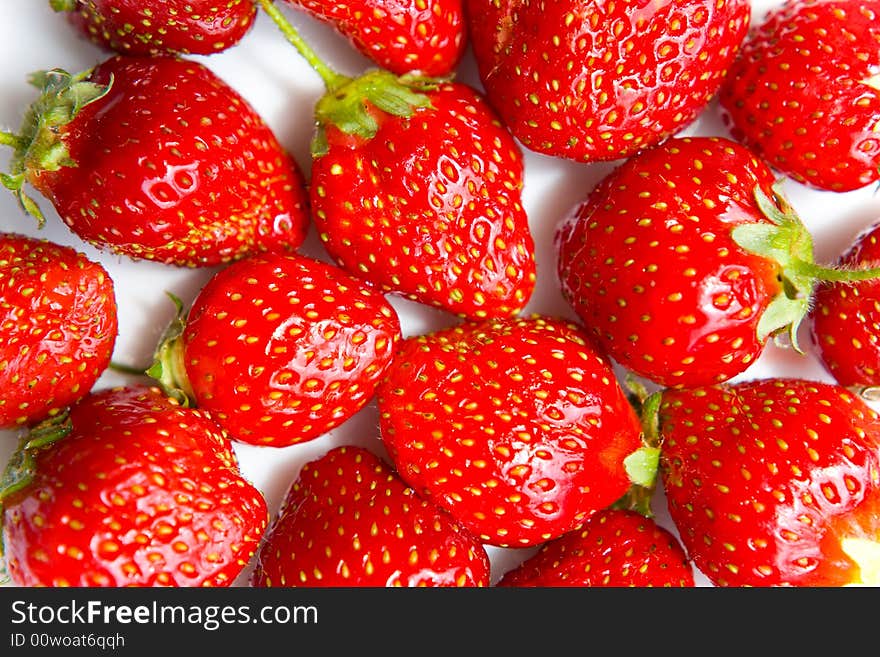 Group of strawberries close-up on white. Group of strawberries close-up on white