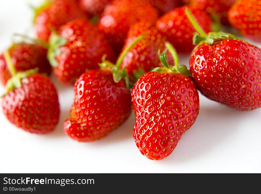 Group of strawberries close-up on white. Group of strawberries close-up on white