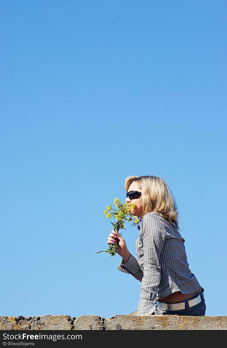 Girl Sniffing Flowers