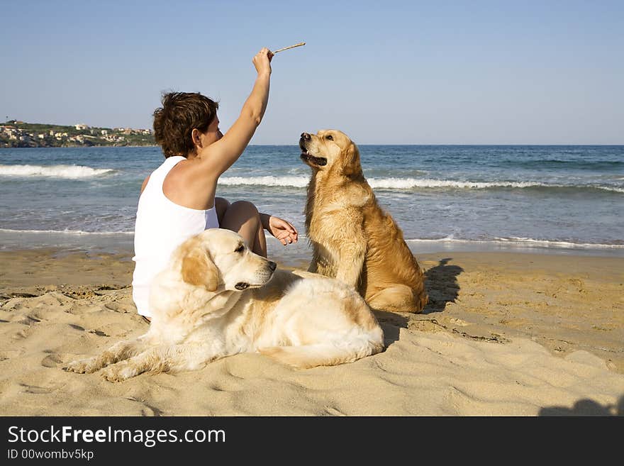 Young girl and sitting with her dogs