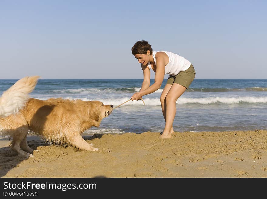 Yong Girl Playing With Her Dog