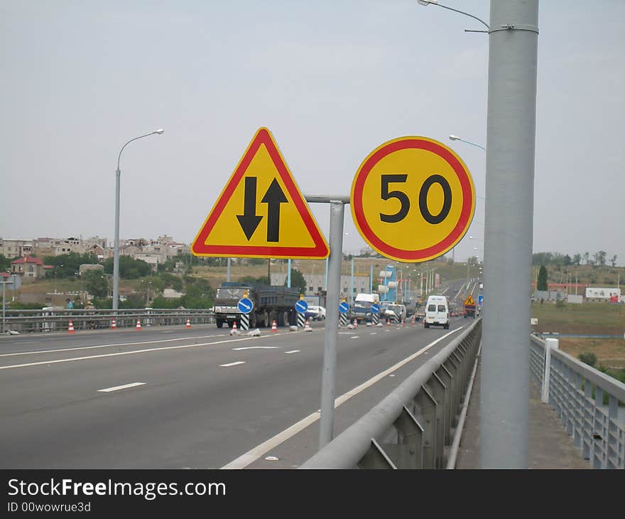 Traffic signs on bridge