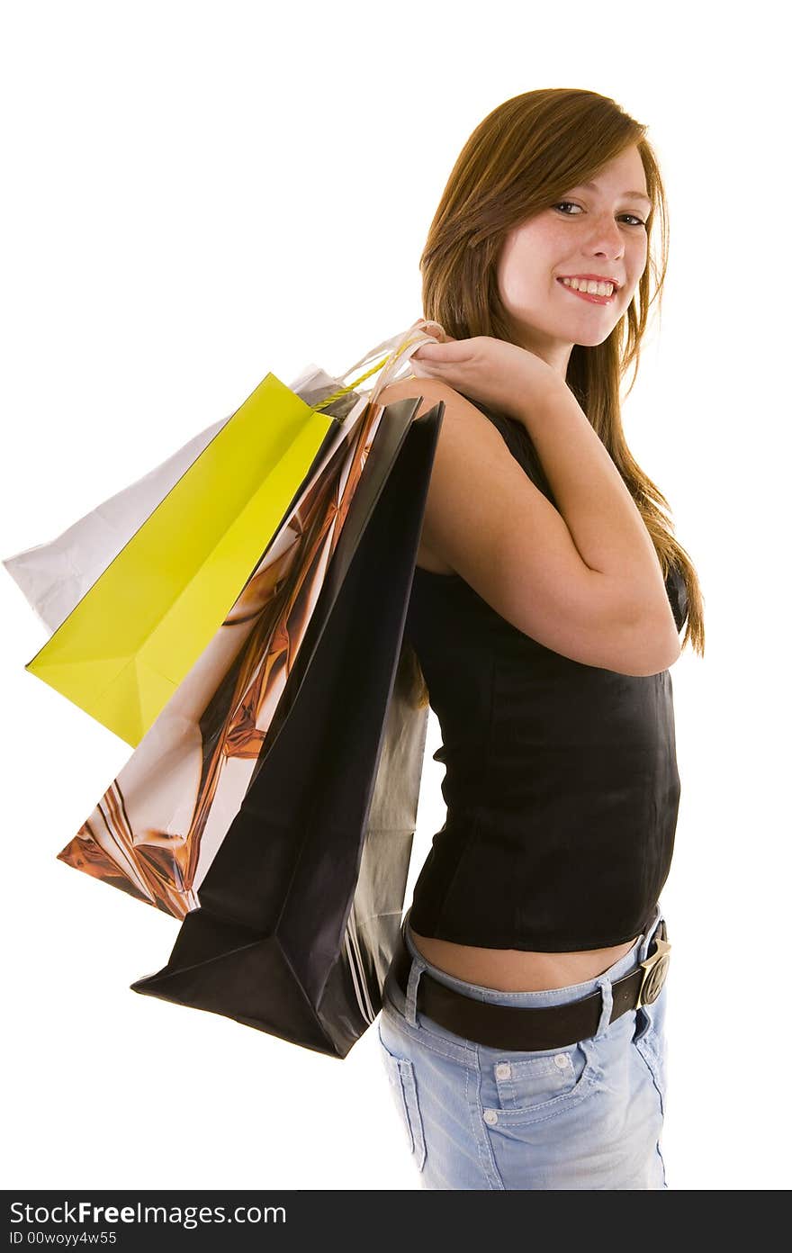 Beautiful young business lady indicating and shopping, looking happy, isolated on white.